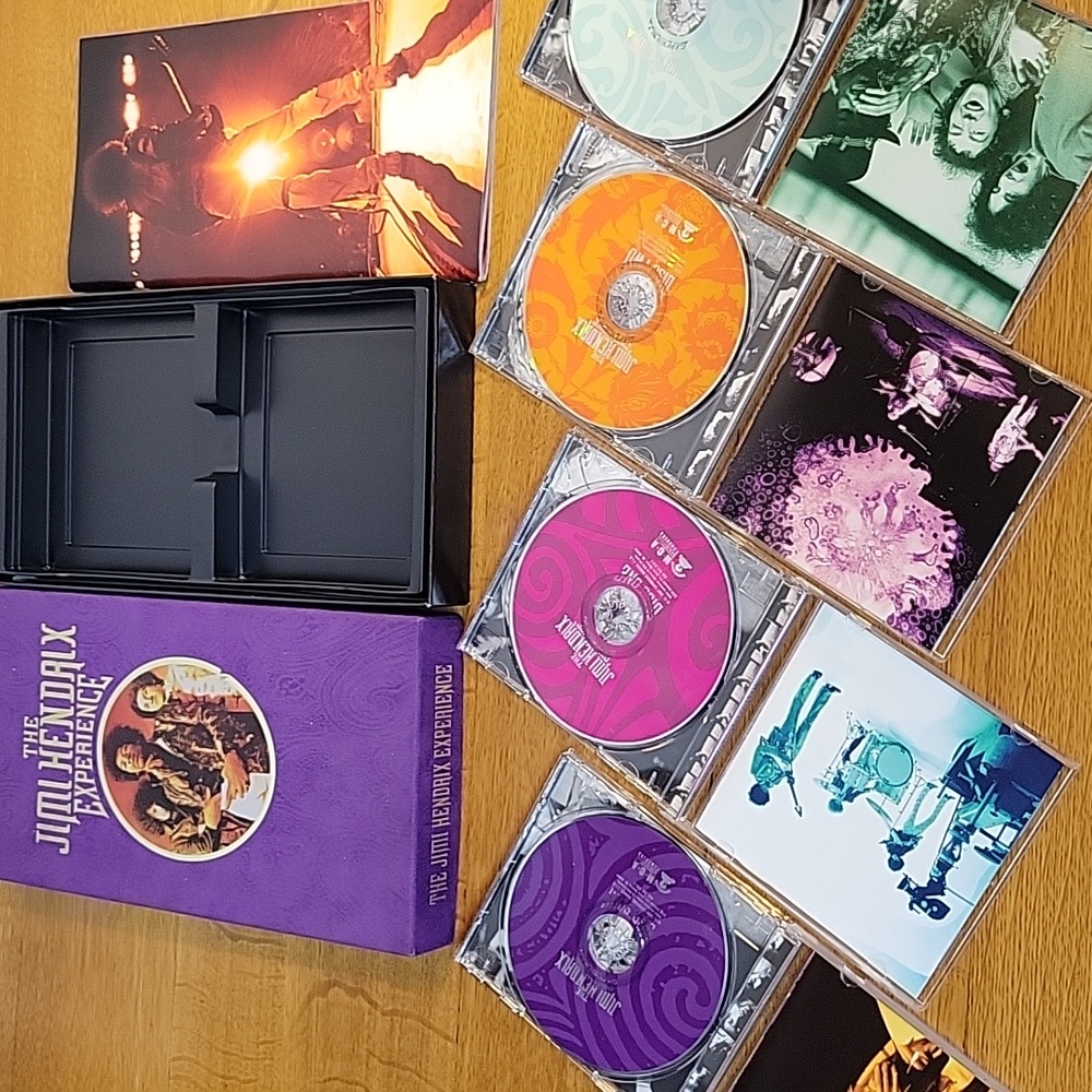 The Jimi Hendrix Experience 4 CD's And Book(79 Pages)  In Purple Case